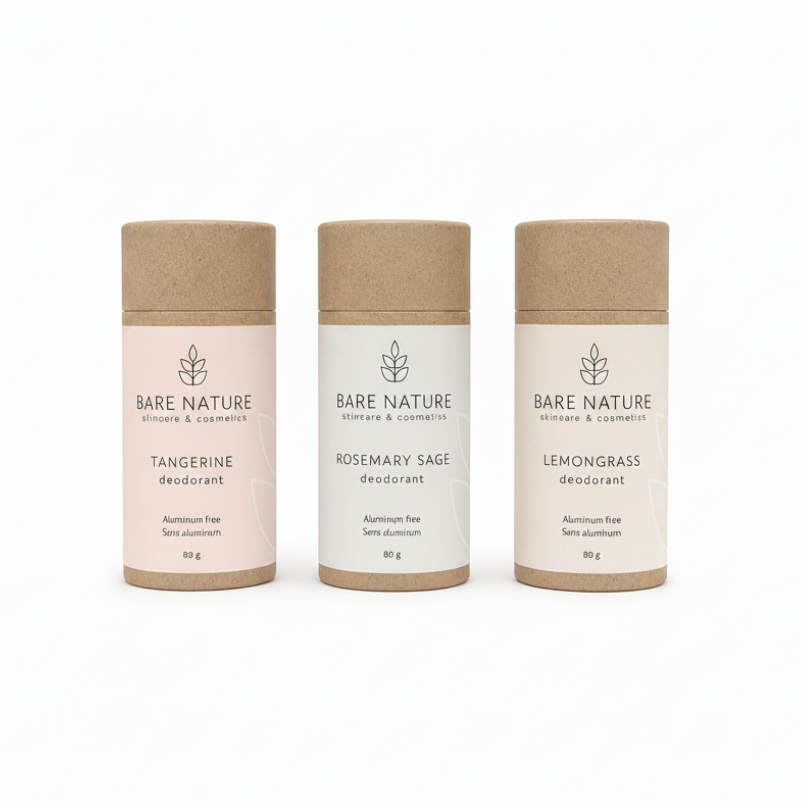 Three Bare Nature skincare deodorant stick tubes in kraft paper packaging, shown side by side on a white background. The labels are light pink, white, and cream, with text for Tangerine, Rosemary Sage, and Lemongrass deodorant.