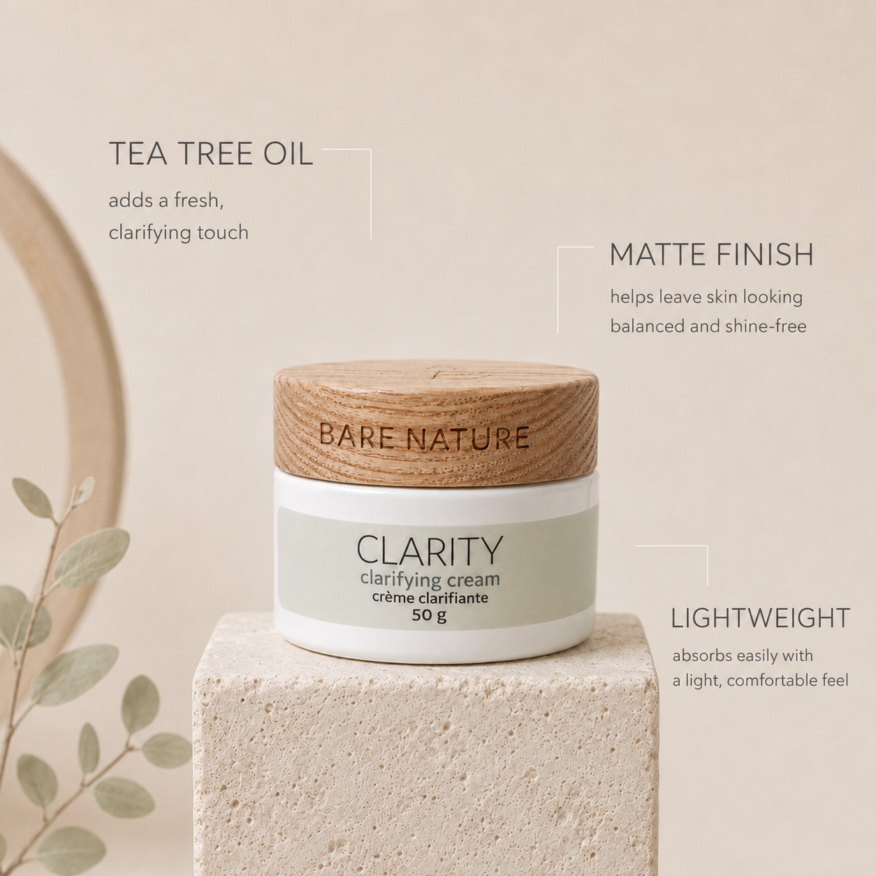 A cosmetic jar labeled 'BARE NATURE Clarity Clarifying Cream 50 g' sits on a textured stone pedestal with marketing text callouts around it: tea tree oil, matte finish, and lightweight.