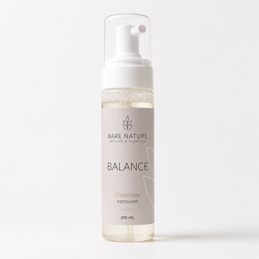 A 210 mL pump bottle of Bare Nature Balance Cleanser, featuring a white pump, clear cap, and a light pink label with black text, set against a clean white background.