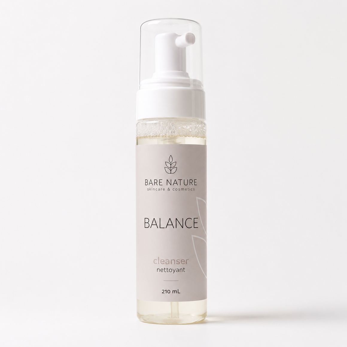A 210 mL pump bottle of Bare Nature Balance Cleanser, featuring a white pump, clear cap, and a light pink label with black text, set against a clean white background.