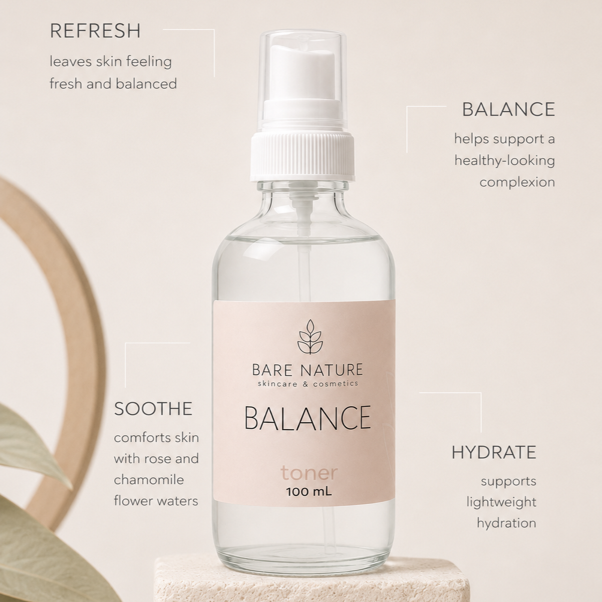 A 100 mL spray bottle of Bare Nature Botanicals Balance Toner, displayed on a textured stone pedestal with decorative leaves and text callouts describing its skin benefits.