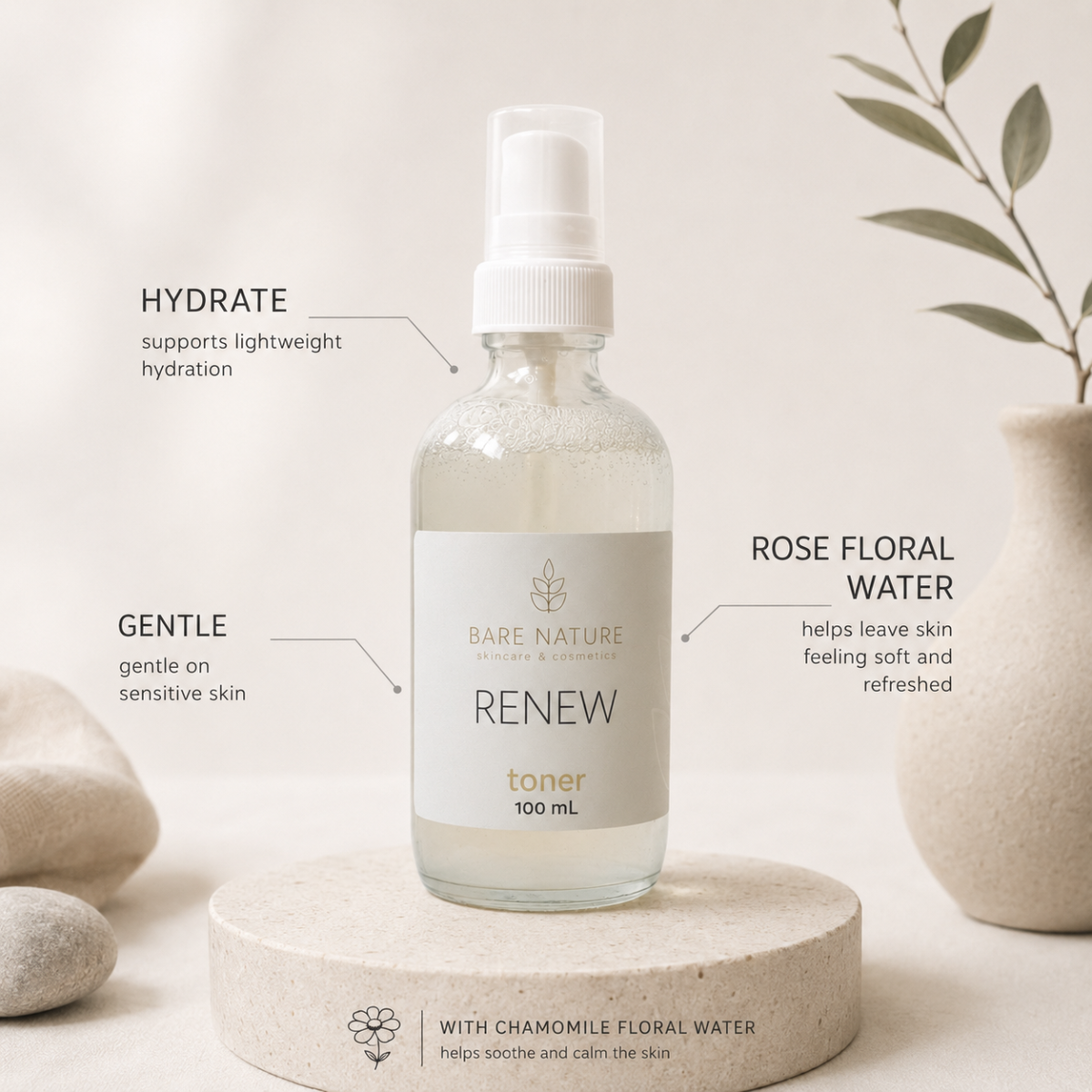 A 100 mL spray bottle of Bare Nature Renew Toner displayed on a round pedestal with decorative stones and a ceramic vase. Text callouts describe the product benefits: Hydrate, Gentle, and Rose Floral Water.