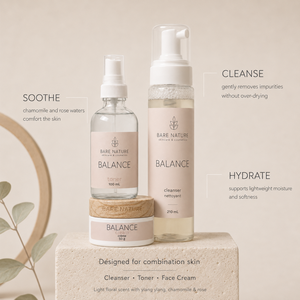 Three Bare Nature Balance skincare products arranged on a stone pedestal against a warm beige background: a small jar, a spray bottle, and a pump bottle, with descriptive text overlays for soothe, cleanse, and hydrate. Bare Nature Skincare Balance Skincare Set for Combination Skin with Chamomile and Rose